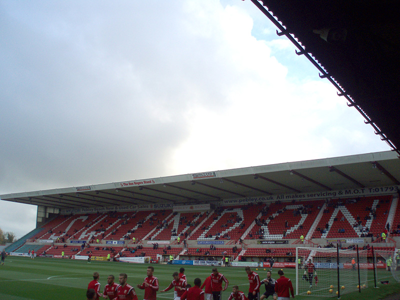 Swindon Town's player warm up before the League 1 game against Bristol City