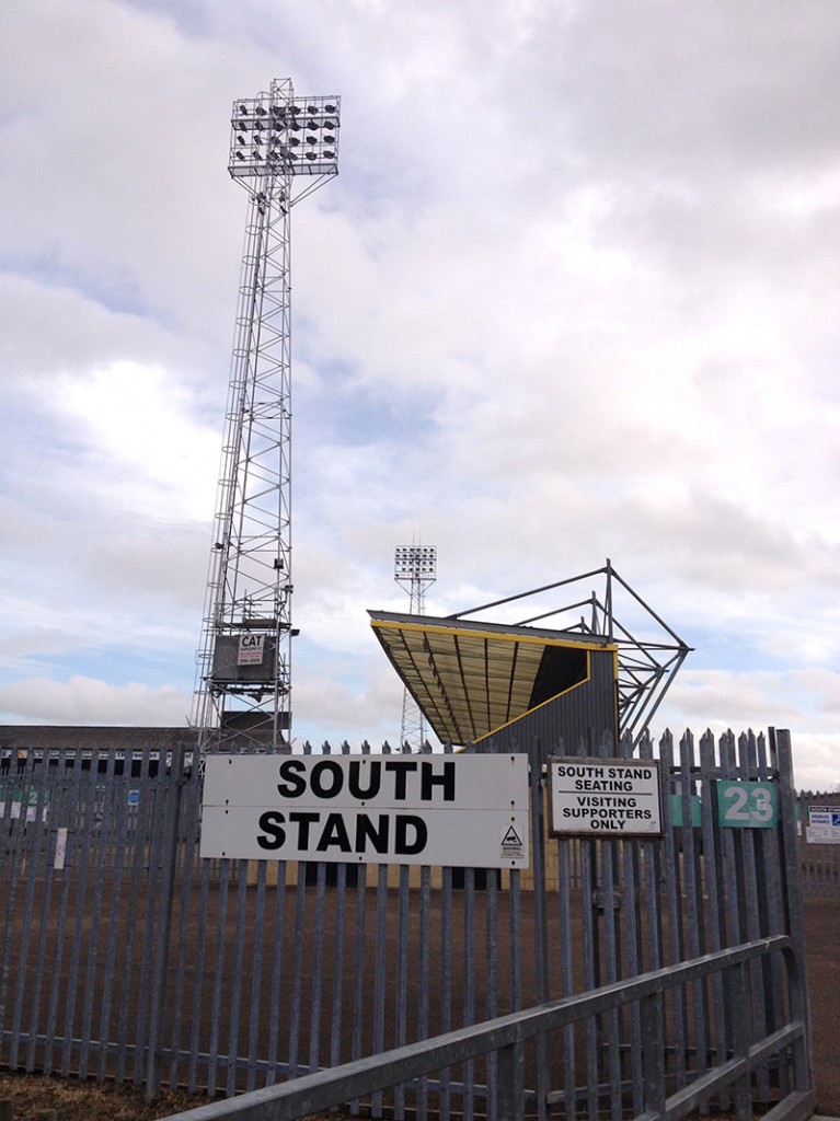 South stand and floodflight at the Abbey Stadium the home of Cambridge United