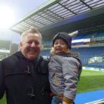 Andrew with his son at Ewood Park