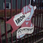 sign on the gate of glanford park home of scunthorpe united