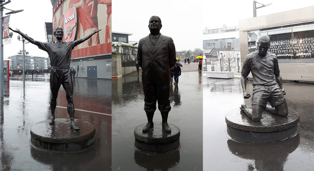 Statues of Tony Adams, Herbert Chapman and Thierry Henry outside the Emirates Stadium