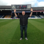 On the pitch at Kenilworth Road doing the 92 club challenge