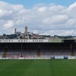 Lincoln cathedral visible over the back of the Stacey West Stand Sincil Bank