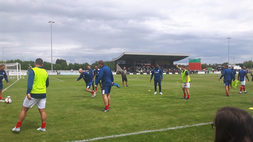 Premier league legends warm up before the non league challenge