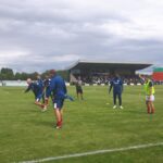 Premier league legends warm up before the non league challenge